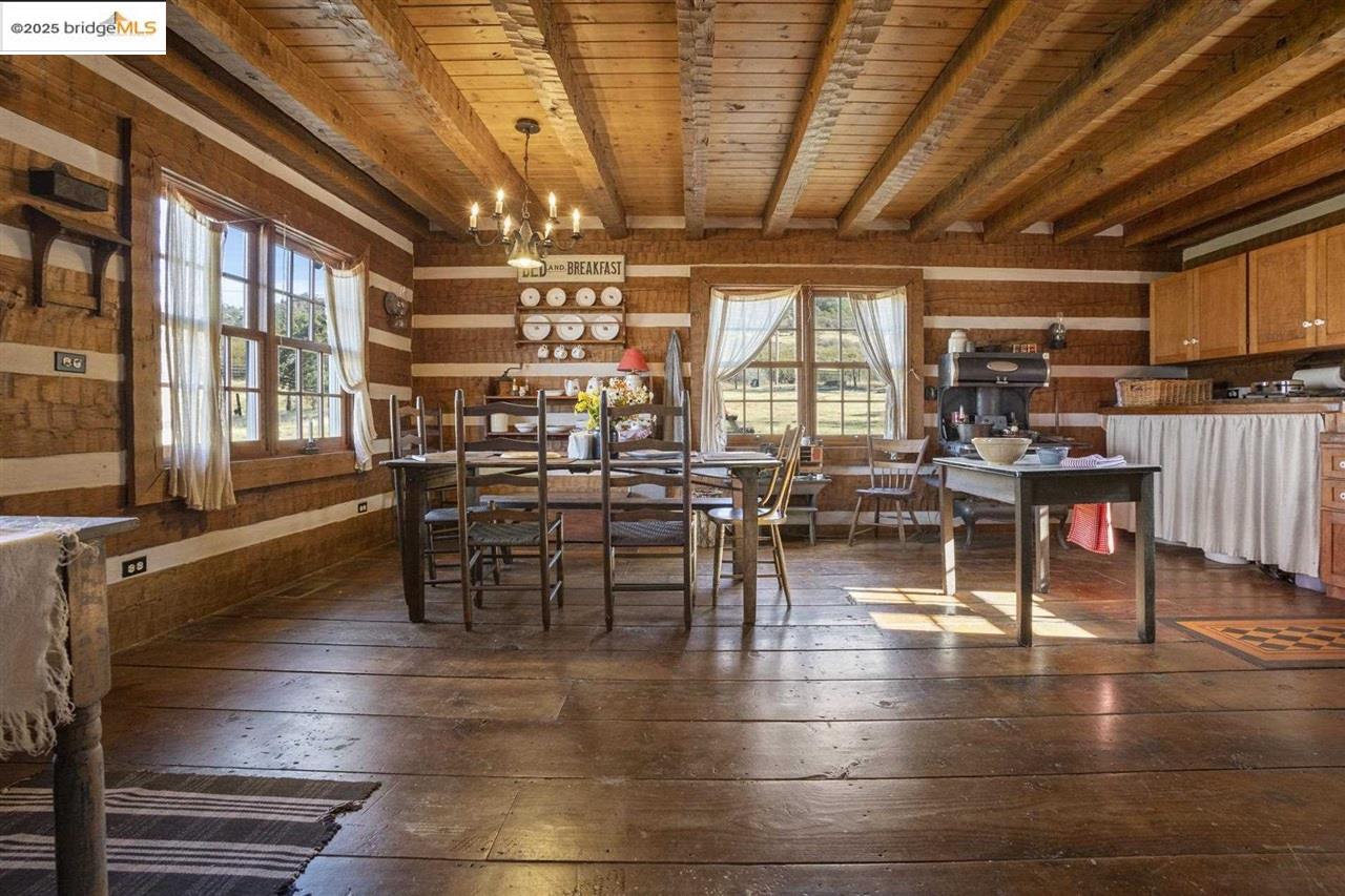 16101 Moccasin Ranch Road Coulterville, CA 95311 - Photo 18 of 60 a view of a dining room with furniture window and outside view