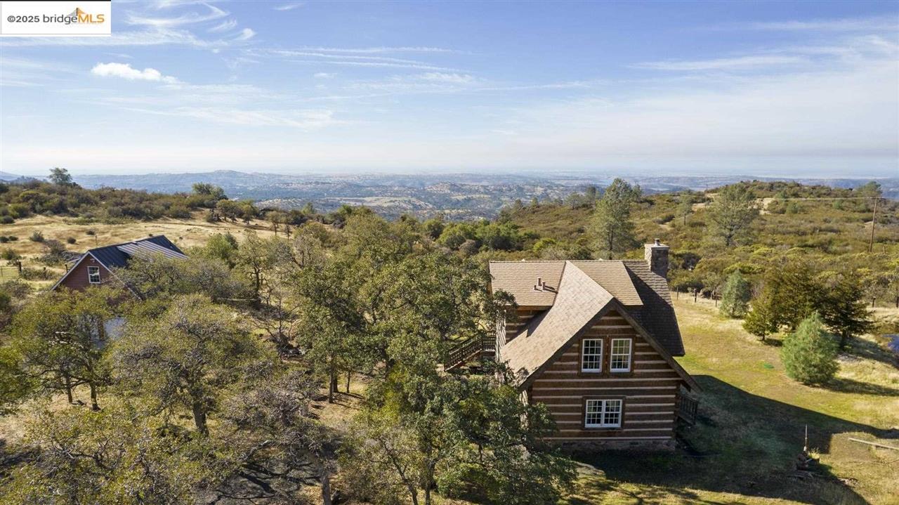 16101 Moccasin Ranch Road Coulterville, CA 95311 - Photo 39 of 60 a view of a city from a terrace