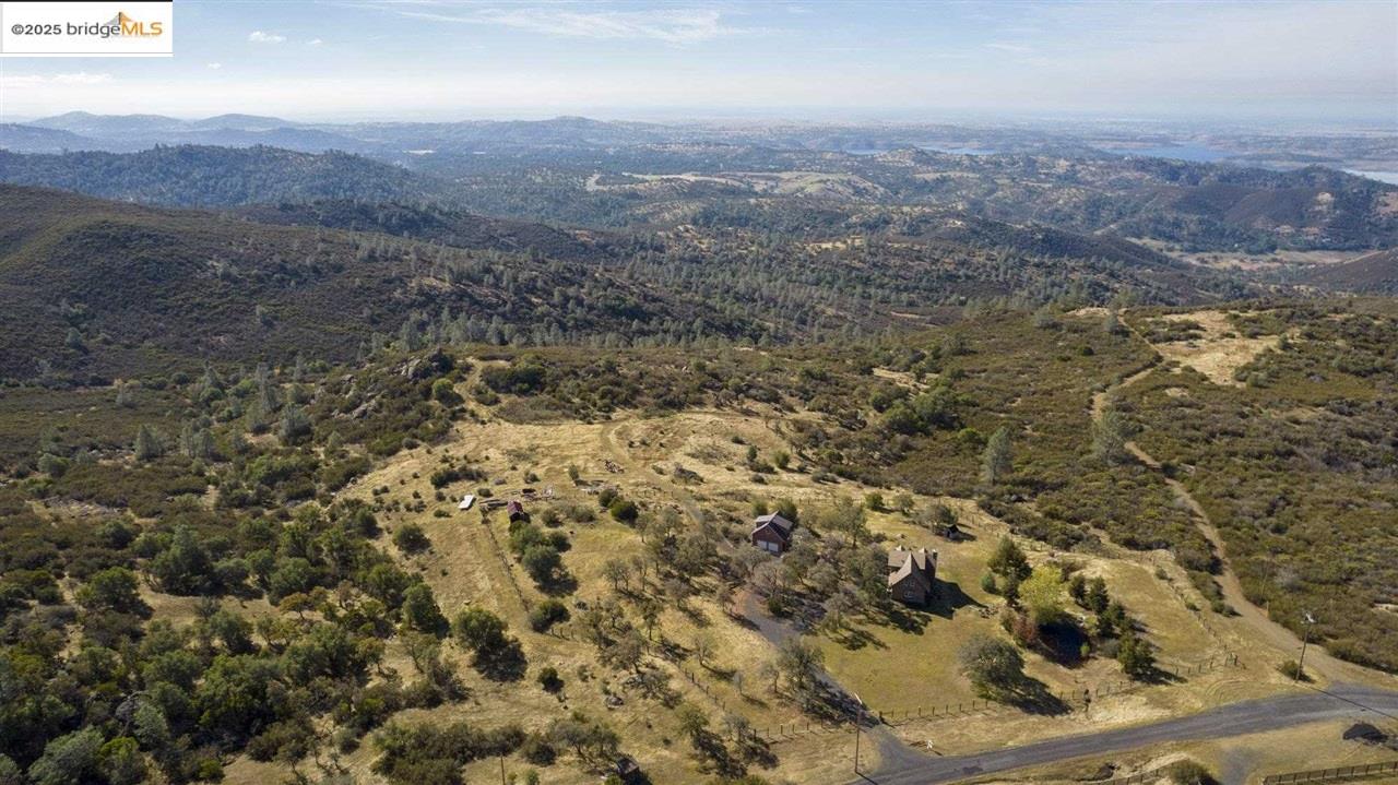 16101 Moccasin Ranch Road Coulterville, CA 95311 - Photo 42 of 60 an aerial view of residential house and green space