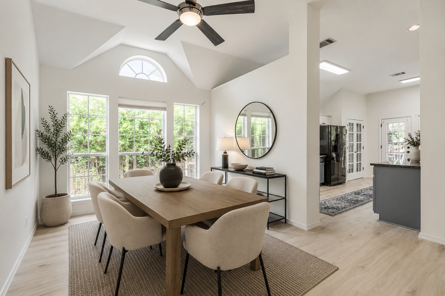 206 Gann Street Georgetown, TX 78626 - Photo 2 of 19 a view of a dining room with furniture a chandelier and wooden floor