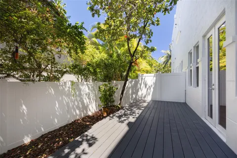 a view of a pathway with a yard