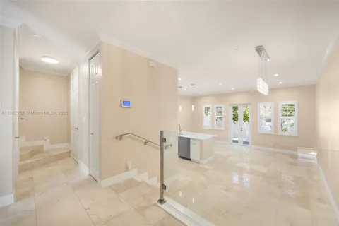 a kitchen with a sink and a stove