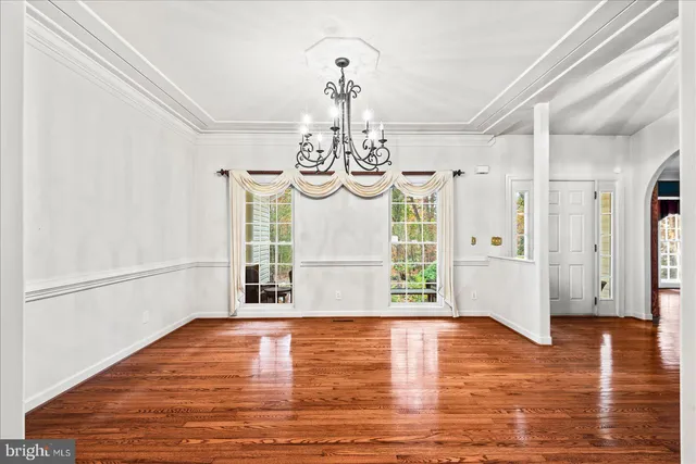 a view of kitchen with furniture and wooden floor