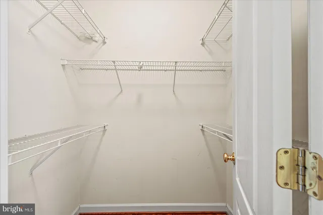 a spacious bathroom with a double vanity sink mirror and double