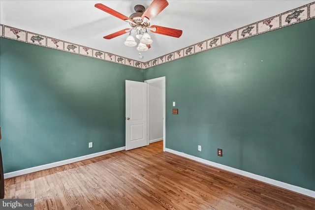 a house with trees in the background