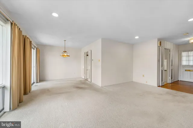 an empty room with a natural light