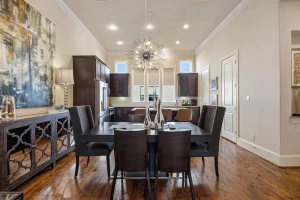 a kitchen with stainless steel appliances a stove sink and refrigerator