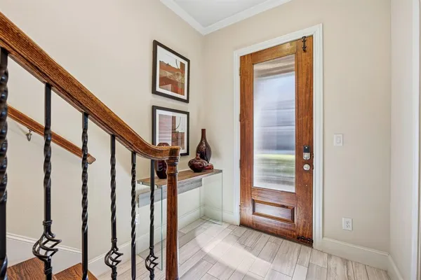 a view of an entryway with staircase