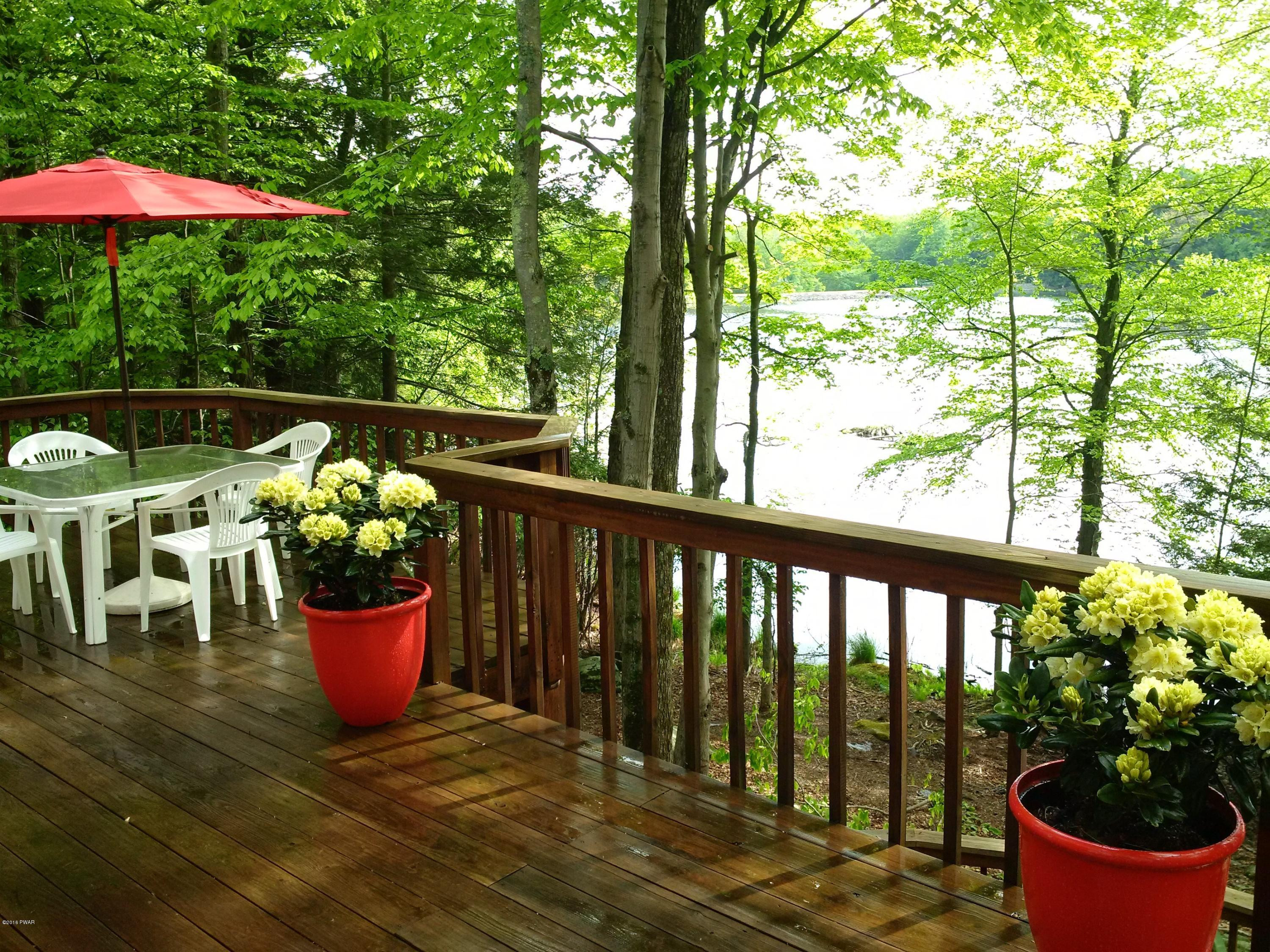 3016 Northgate Road Lake Ariel, PA 18436 - Photo 57 of 58 a view of a porch with furniture and potted plants