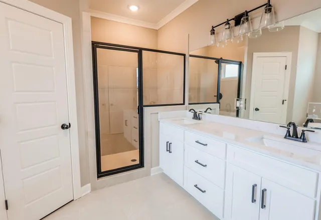 a white bath tub sitting in a bathroom