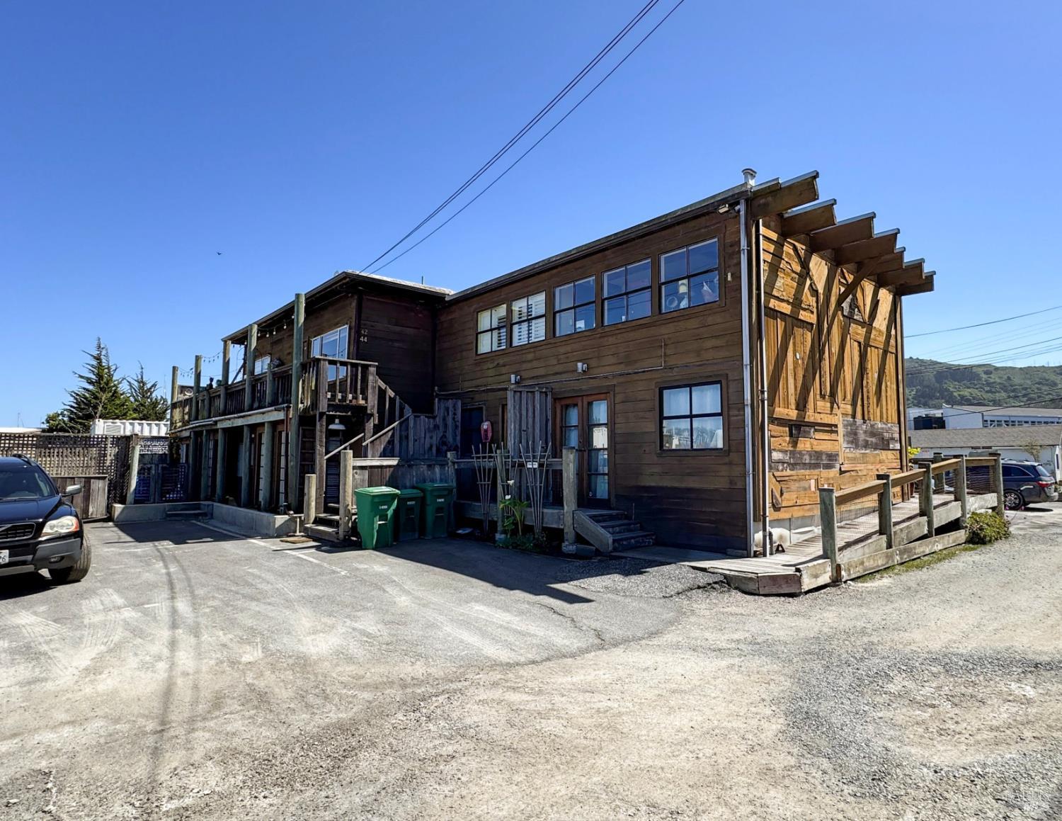 40 Varda Landing Road Sausalito, CA 94965 - Photo 4 of 7 a view of a house with a wooden fence