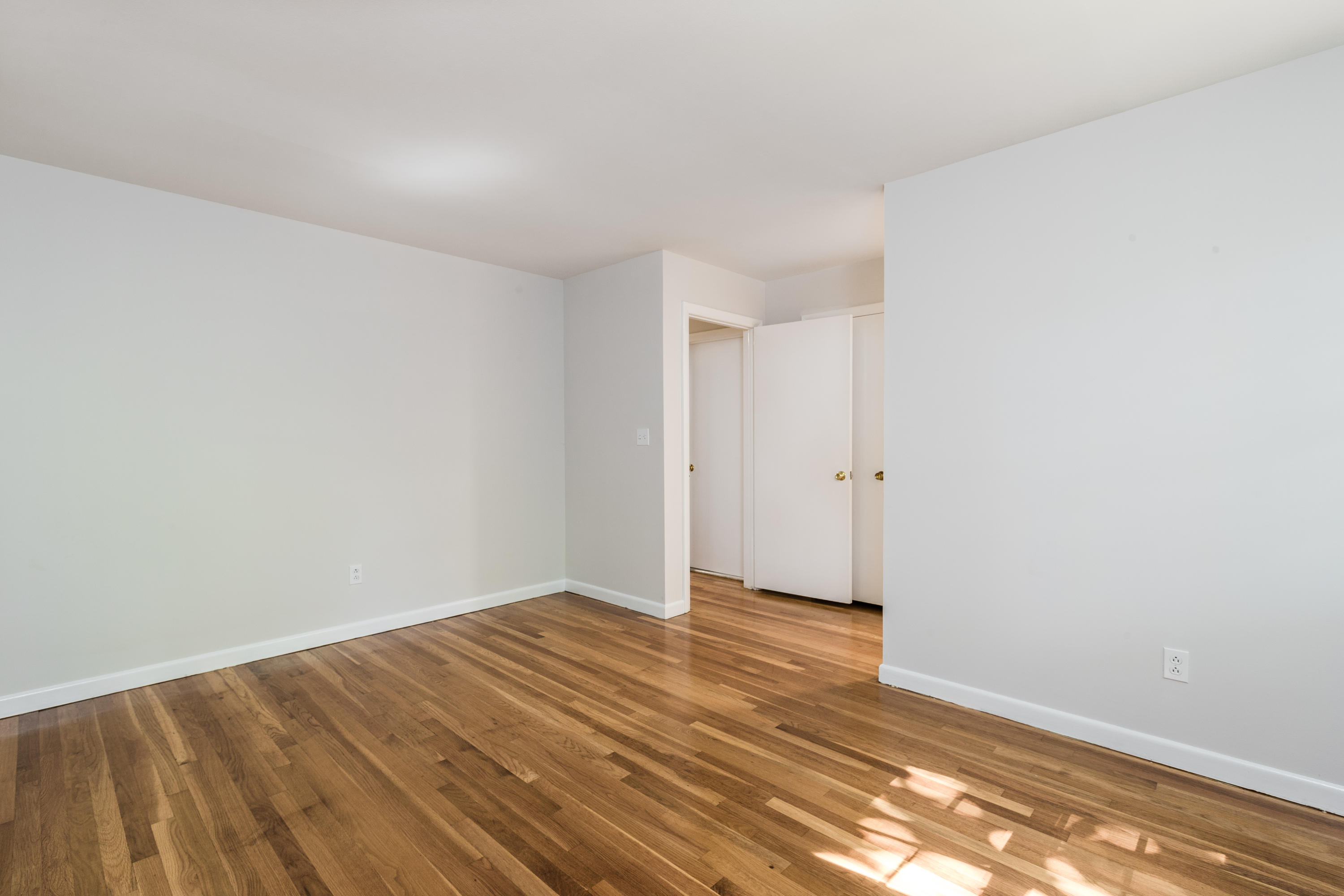 4 Littlebrook Road North Darien, CT 06820 - Photo 11 of 42 a view of an empty room and wooden floor