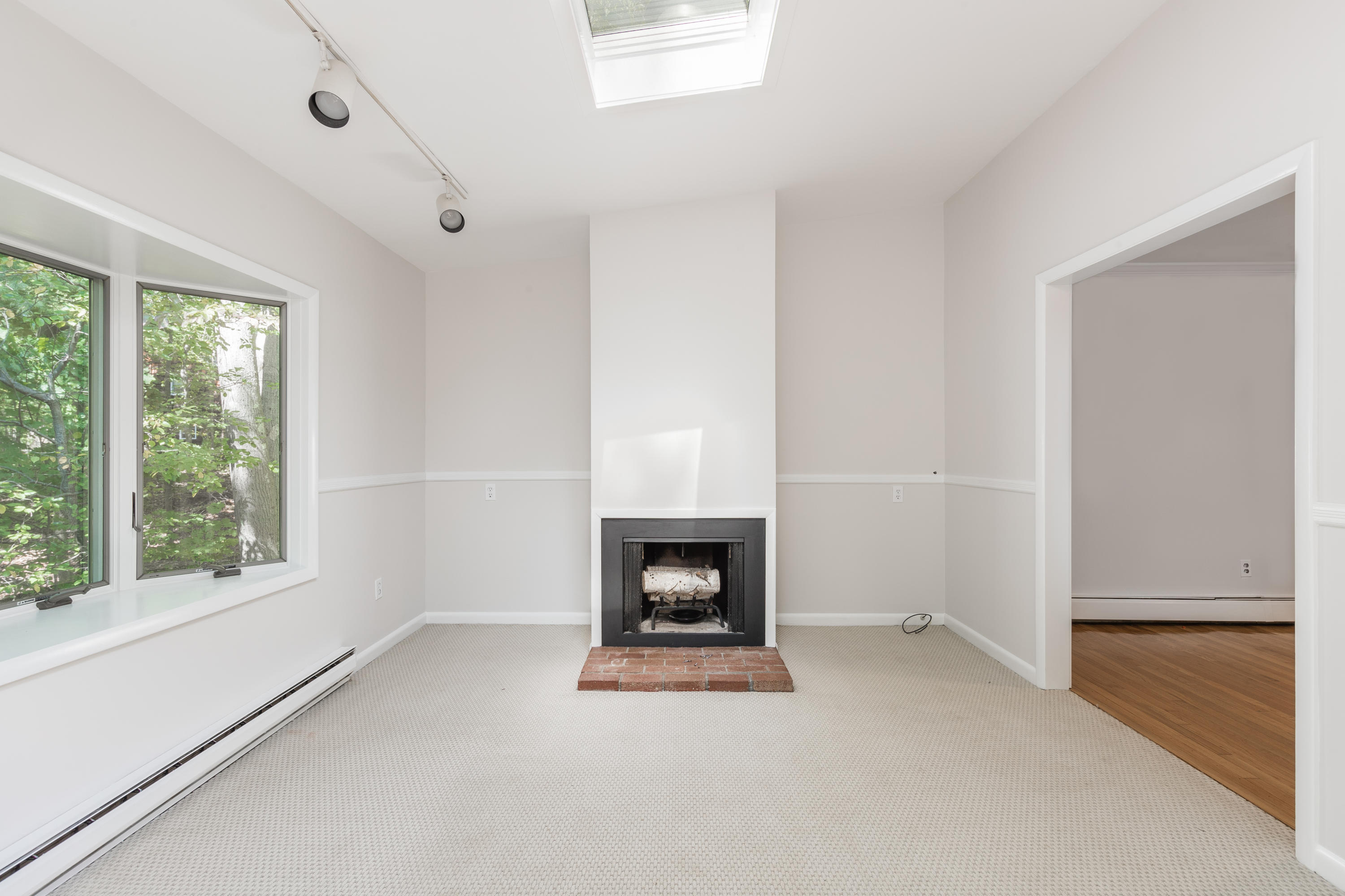 4 Littlebrook Road North Darien, CT 06820 - Photo 16 of 42 a room with a fireplace and window