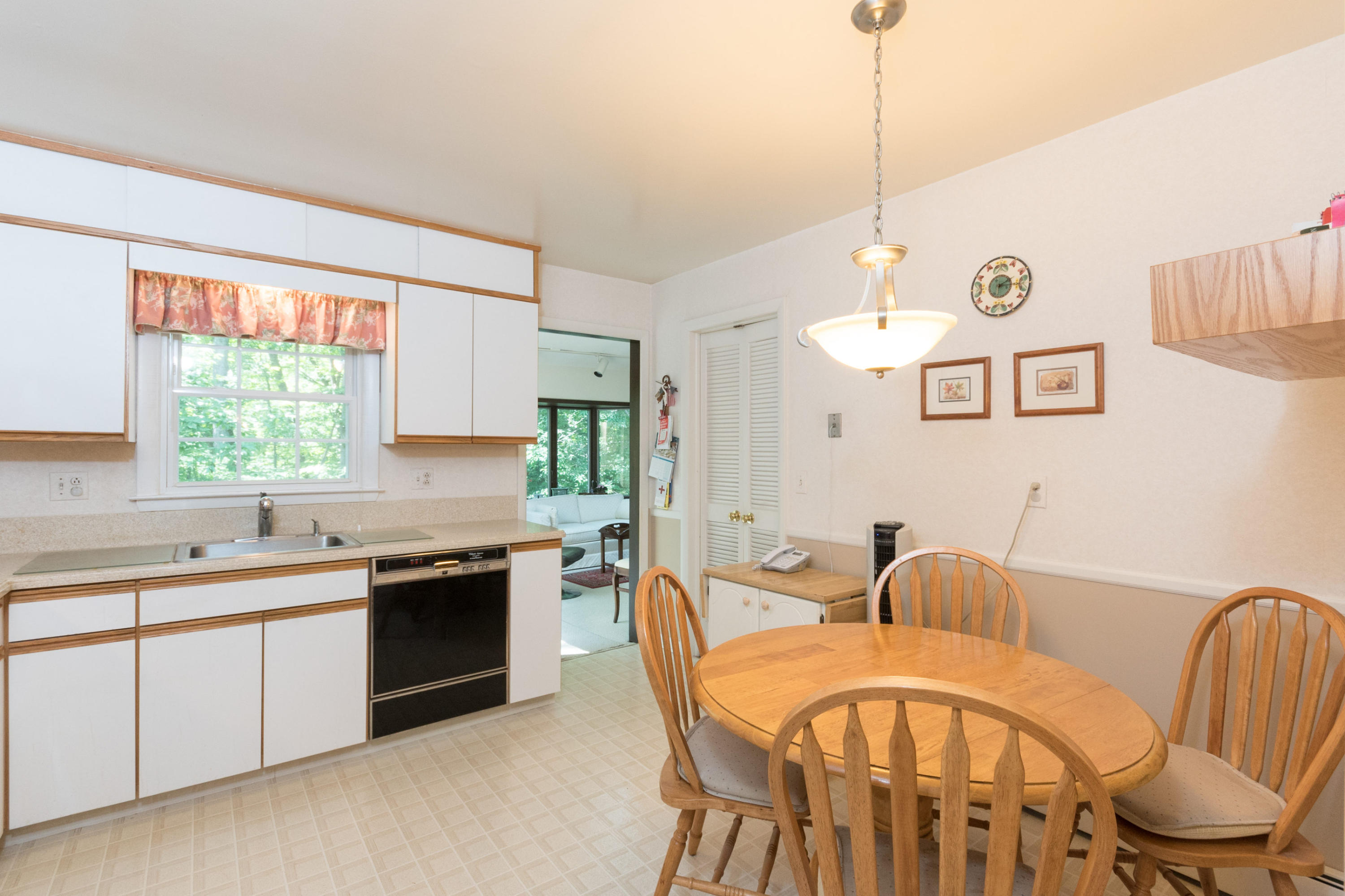 4 Littlebrook Road North Darien, CT 06820 - Photo 21 of 42 a view of a kitchen area with furniture and window