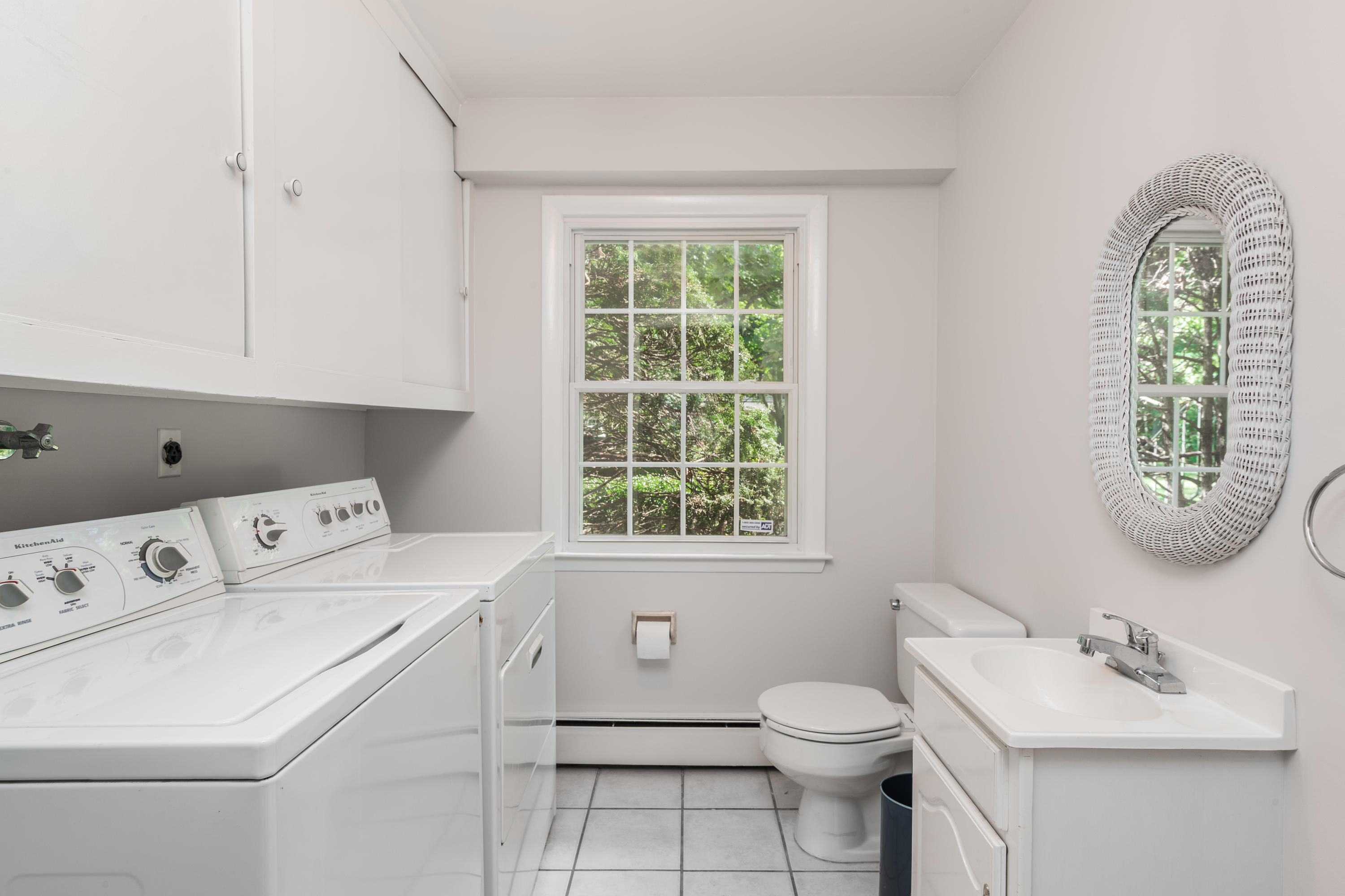 4 Littlebrook Road North Darien, CT 06820 - Photo 25 of 42 a bathroom with a sink a toilet and a window