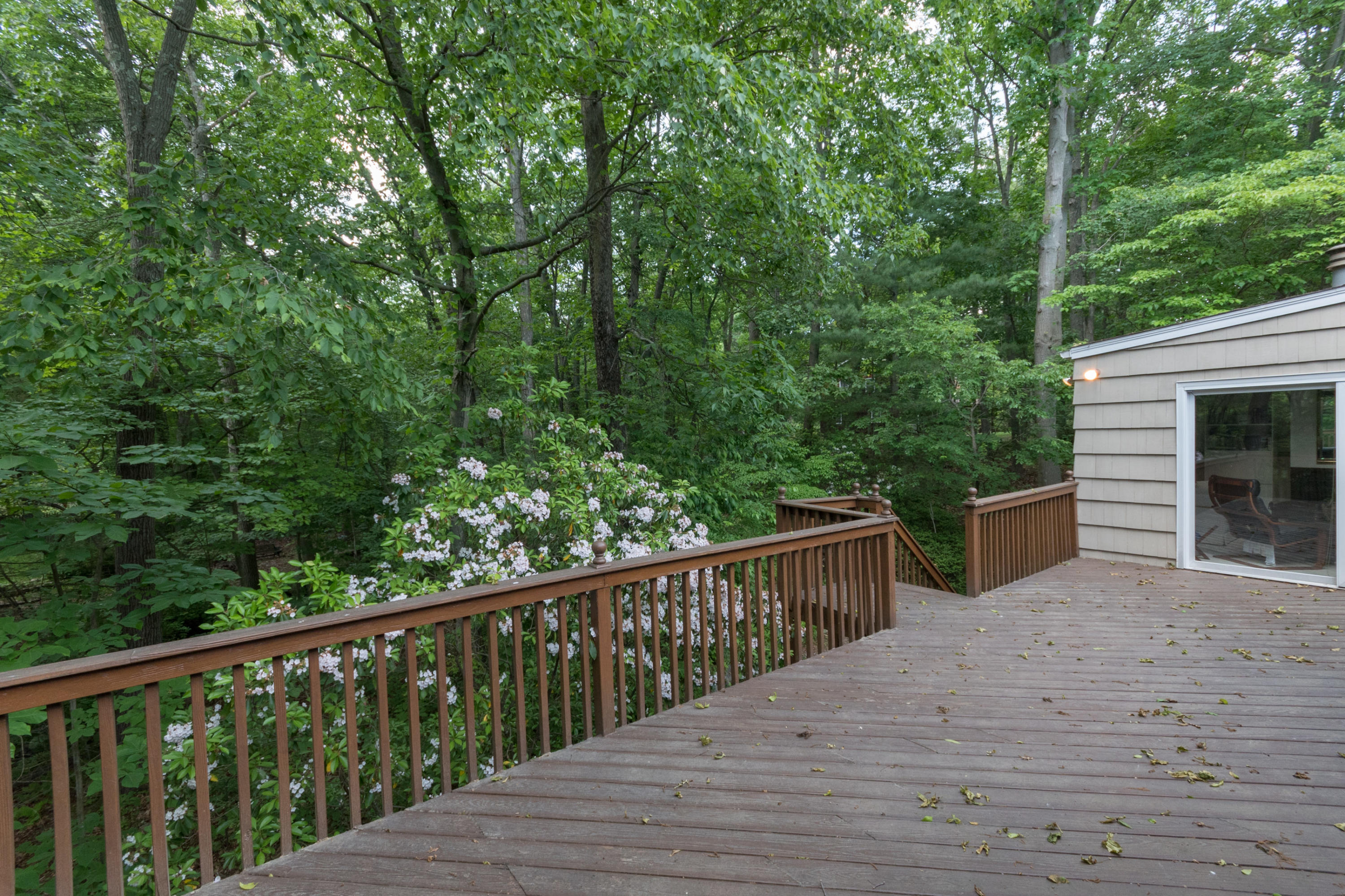 4 Littlebrook Road North Darien, CT 06820 - Photo 40 of 42 a balcony with wooden floor and yard in the back