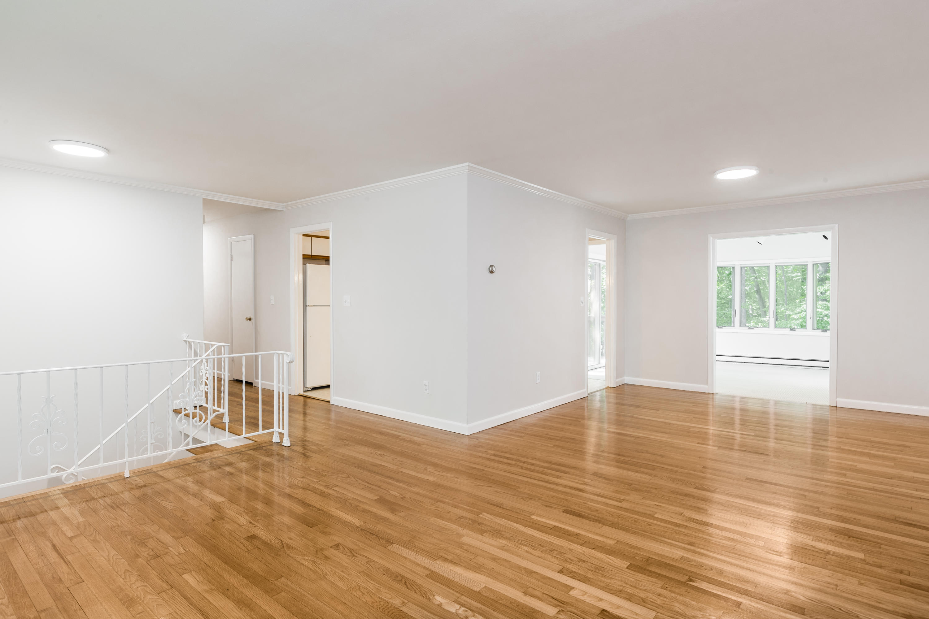 4 Littlebrook Road North Darien, CT 06820 - Photo 5 of 42 a view of empty room with wooden floor and fan