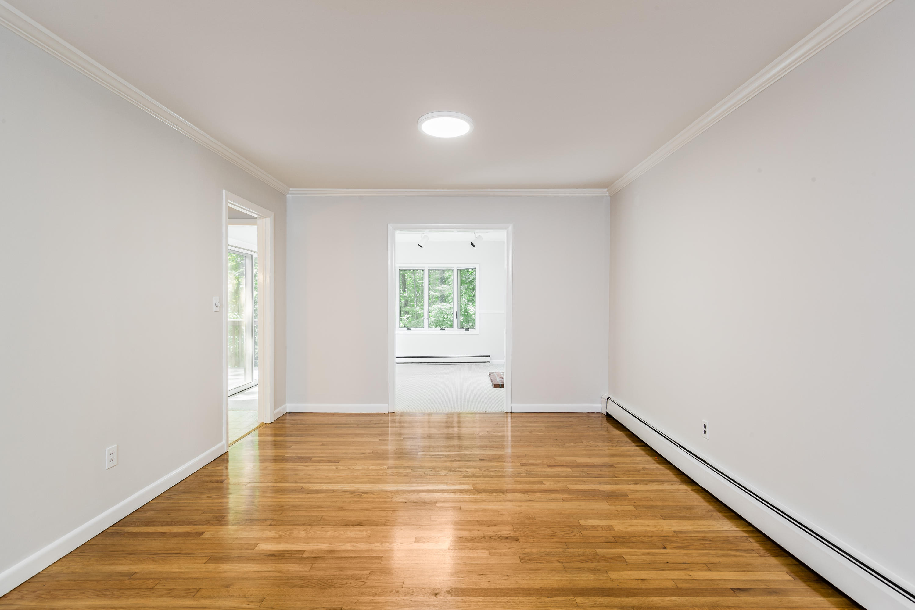 4 Littlebrook Road North Darien, CT 06820 - Photo 8 of 42 a view of empty room with wooden floor and fan