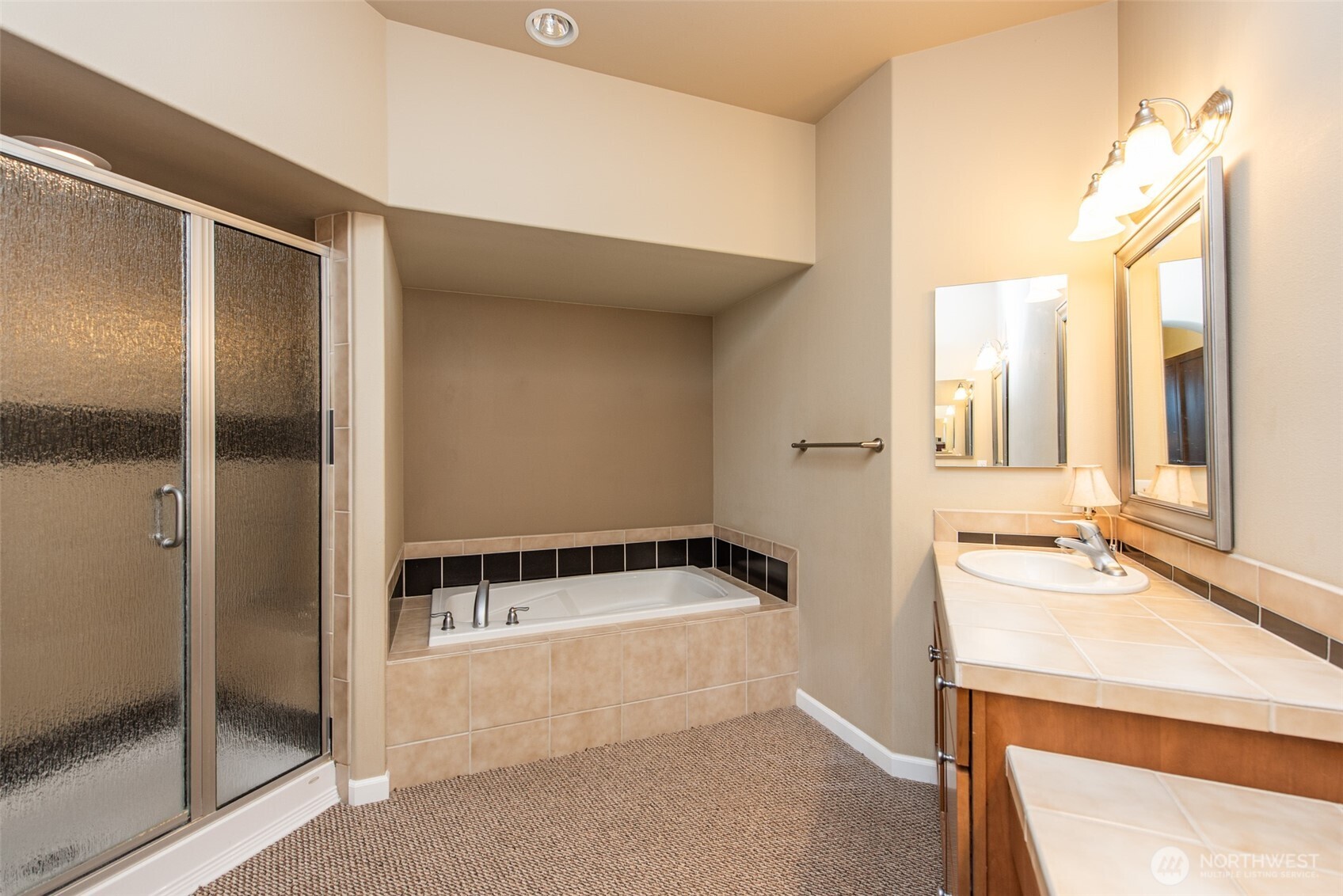 71 Mt Baker Drive Sequim, WA 98382 - Photo 12 of 25 a bathroom with a bathtub and a sink