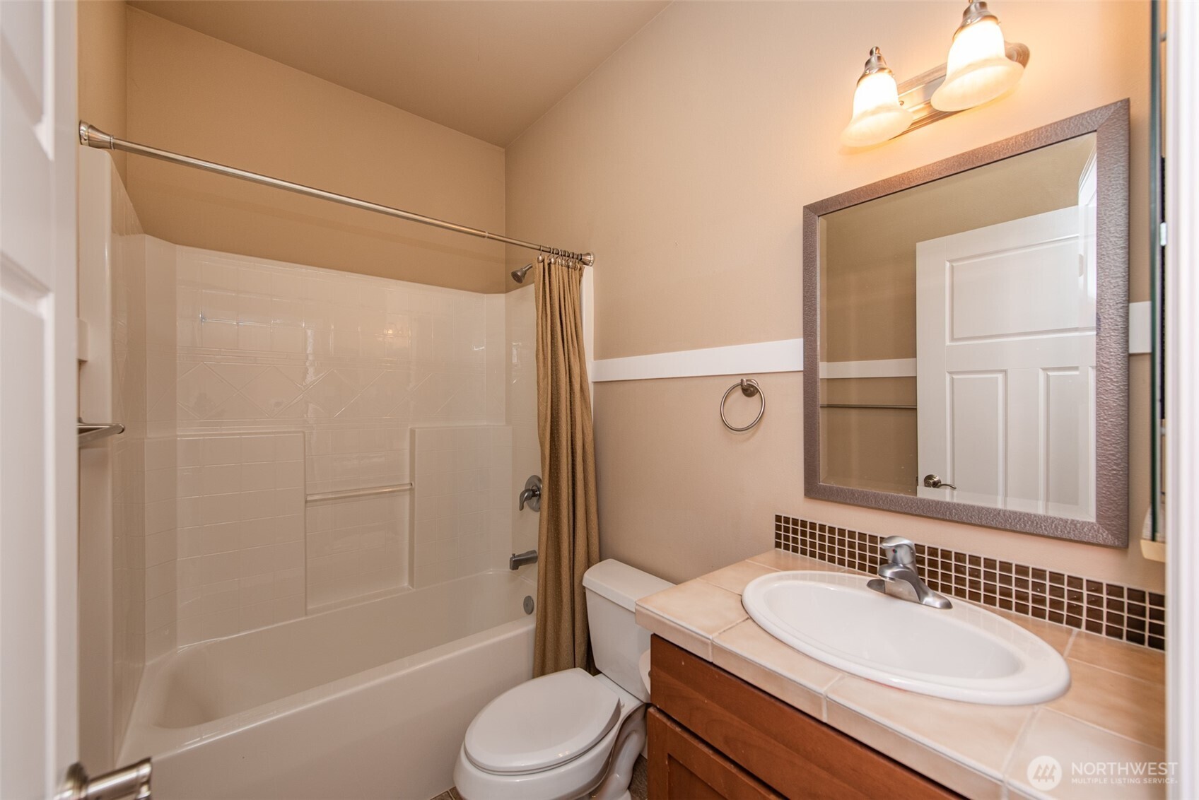 71 Mt Baker Drive Sequim, WA 98382 - Photo 14 of 25 a bathroom with a sink a toilet and shower