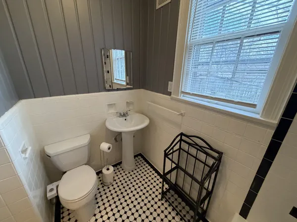 a bathroom with a bathtub and shower