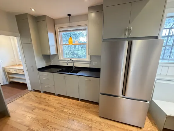 a kitchen with a stove and a microwave