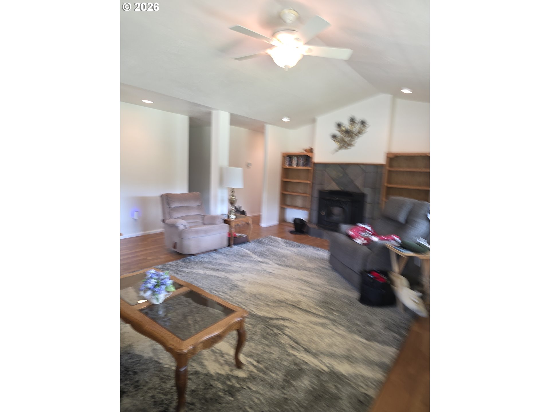 1909 Southwest Duke Road Sutherlin, OR 97479 - Photo 7 of 30 a living room with furniture and a fireplace