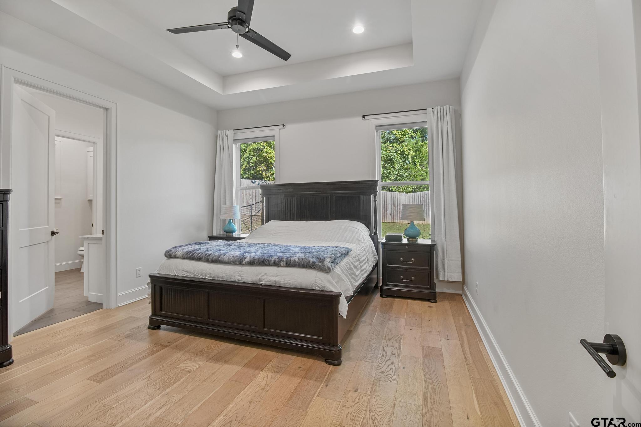 1242 Colt Lane Tyler, TX 75703 - Photo 30 of 47 a bedroom with a bed and a window