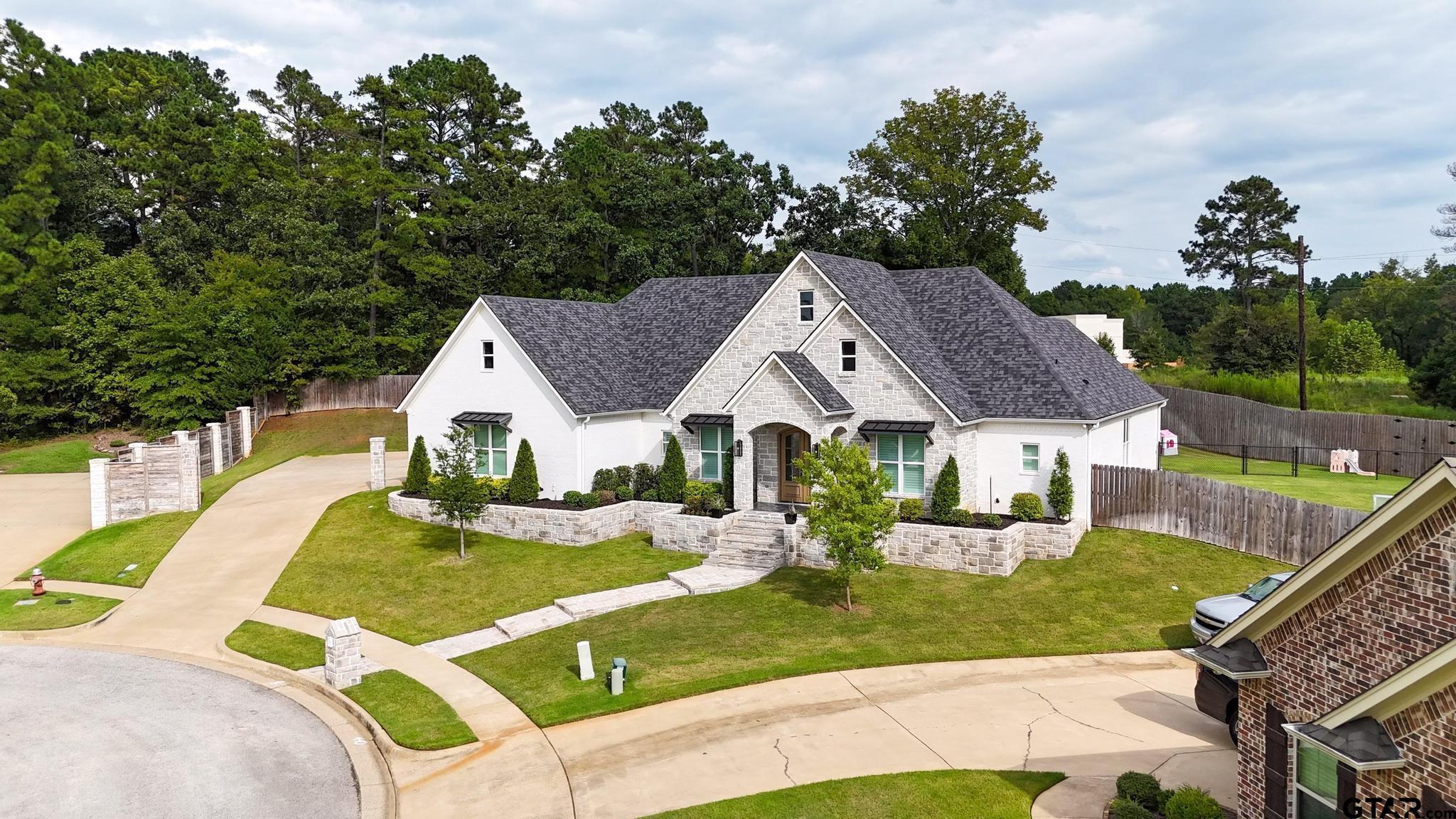 1242 Colt Lane Tyler, TX 75703 - Photo 45 of 47 a view of house with yard outdoor seating and green space