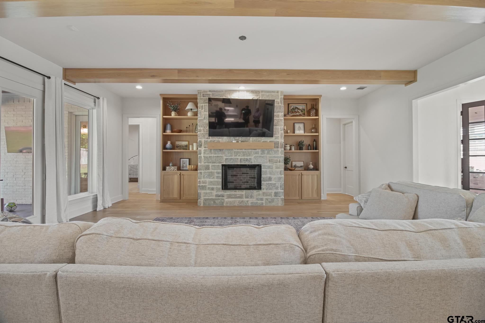 1242 Colt Lane Tyler, TX 75703 - Photo 5 of 47 a living room with furniture and a fireplace