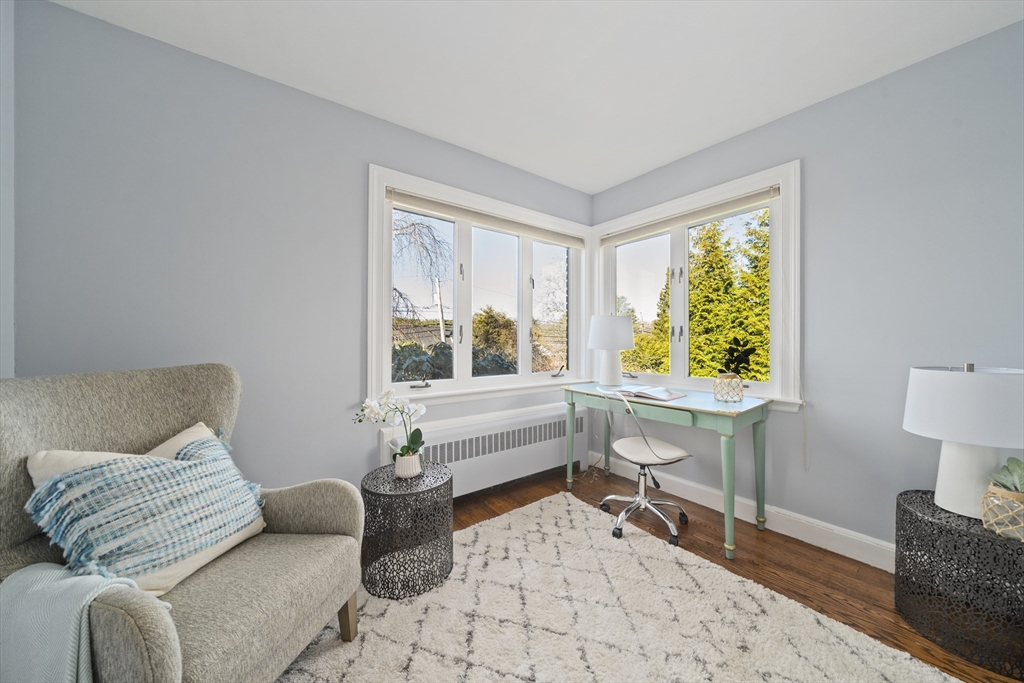 447 Dudley Road Newton, MA 02459 - Photo 22 of 42 a living room with furniture and a window