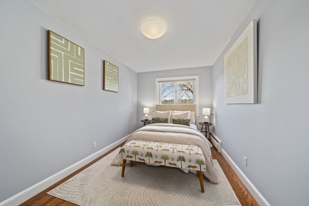 447 Dudley Road Newton, MA 02459 - Photo 23 of 42 a bedroom with a bed and a window