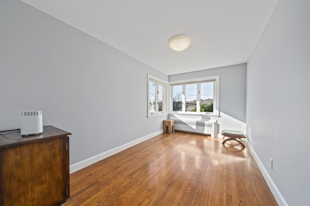 447 Dudley Road Newton, MA 02459 - Photo 24 of 42 a view of a room with wooden floor and a window