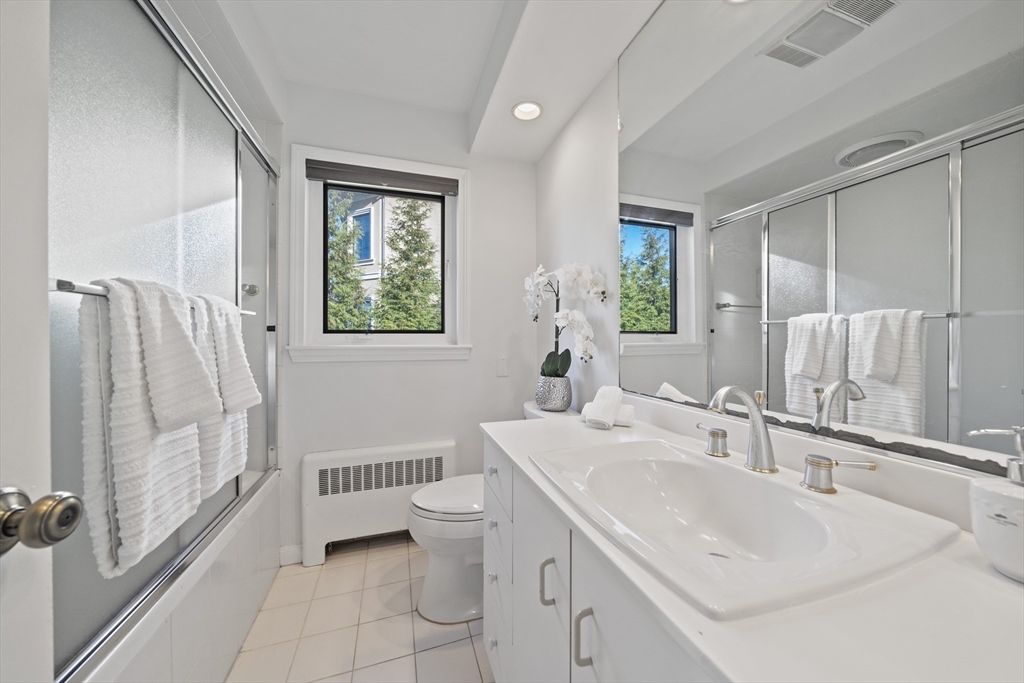 447 Dudley Road Newton, MA 02459 - Photo 25 of 42 a bathroom with a sink toilet and shower