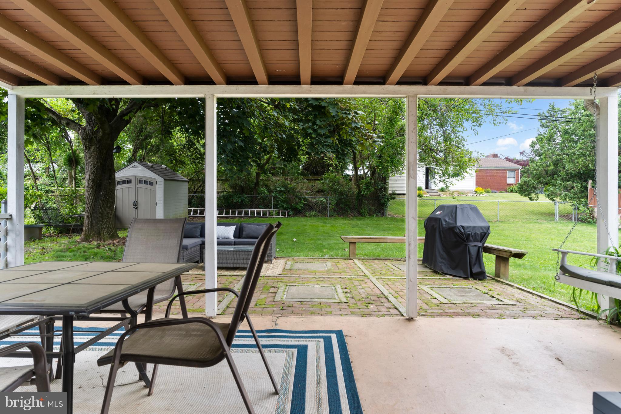 410 Belvedere Road Harrisburg, PA 17109 - Photo 19 of 29 a patio with table and chairs