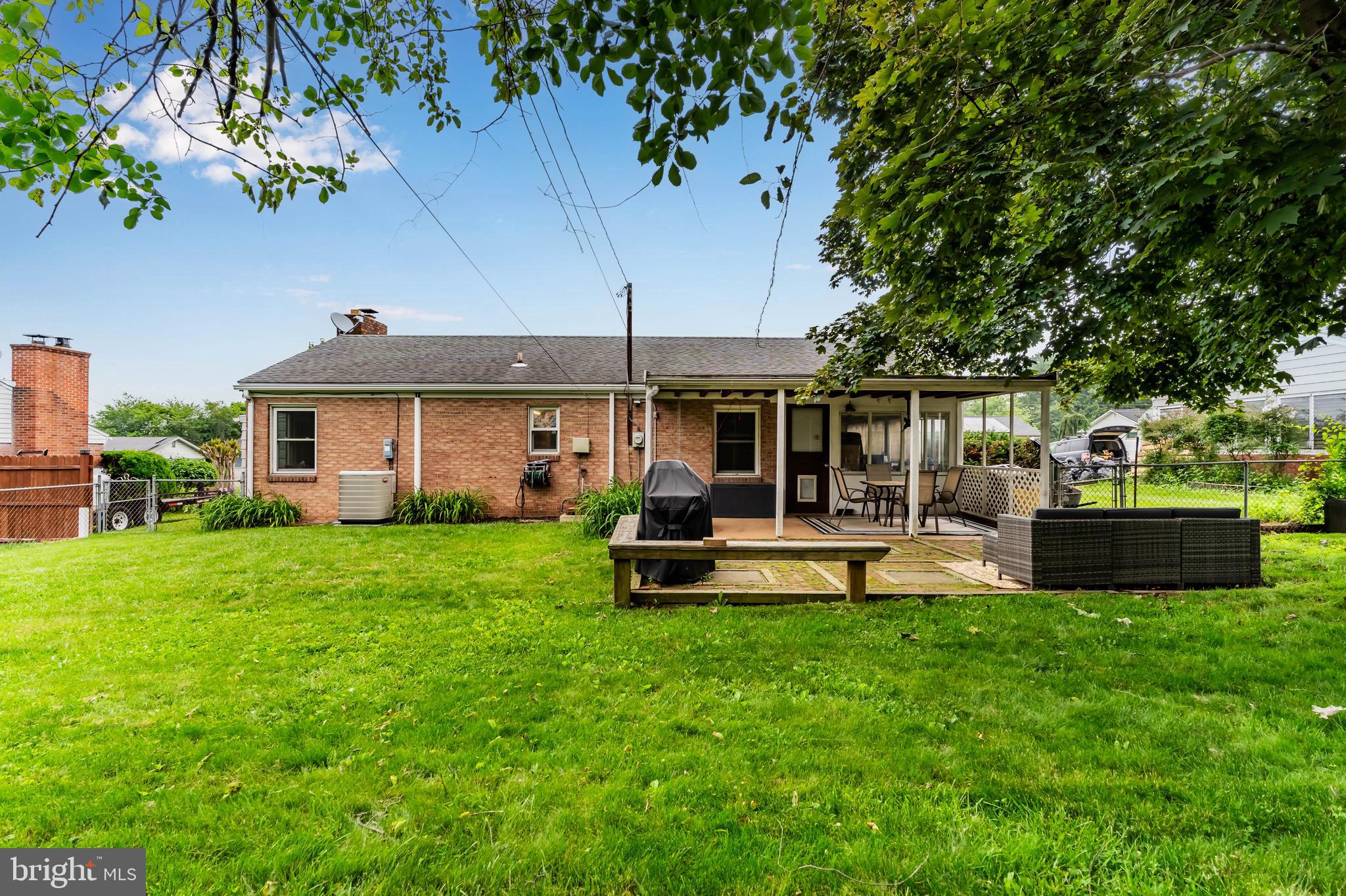 410 Belvedere Road Harrisburg, PA 17109 - Photo 20 of 29 a view of a house with a backyard patio and swimming pool