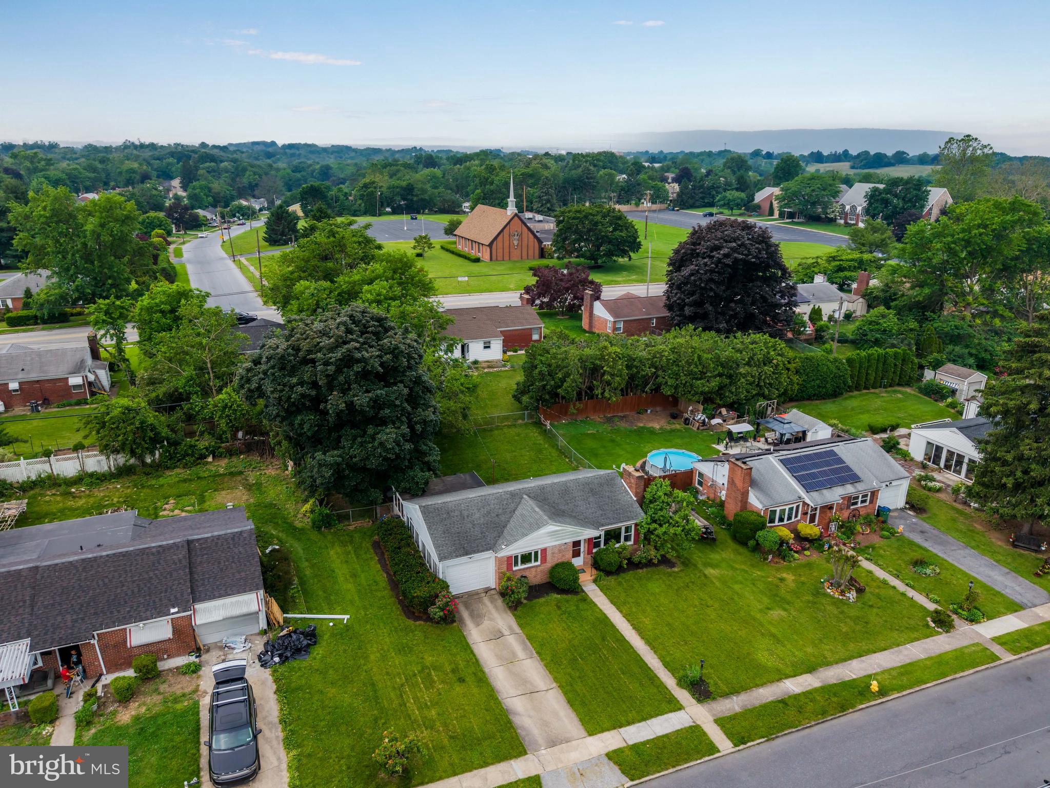 410 Belvedere Road Harrisburg, PA 17109 - Photo 2 of 29 an aerial view of house with yard swimming pool and outdoor seating