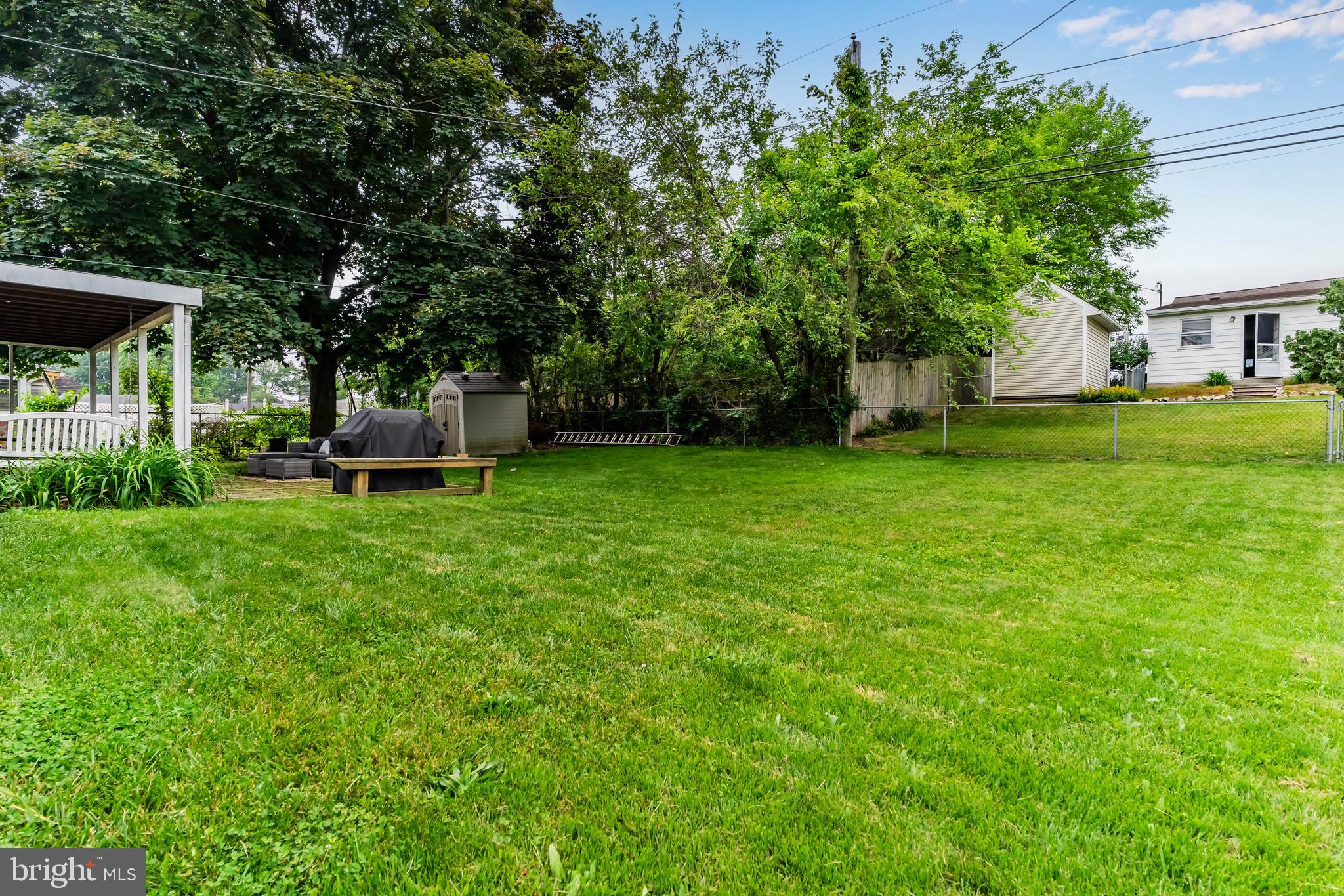 410 Belvedere Road Harrisburg, PA 17109 - Photo 28 of 29 a view of a house with a backyard porch and sitting area