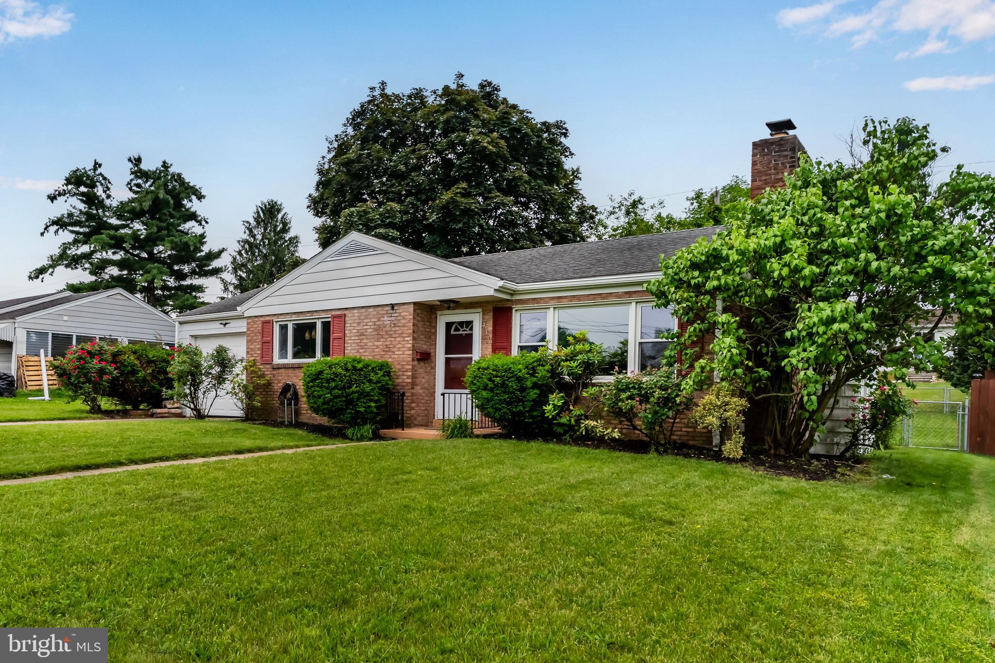 410 Belvedere Road Harrisburg, PA 17109 - Photo 5 of 29 a front view of a house with a yard