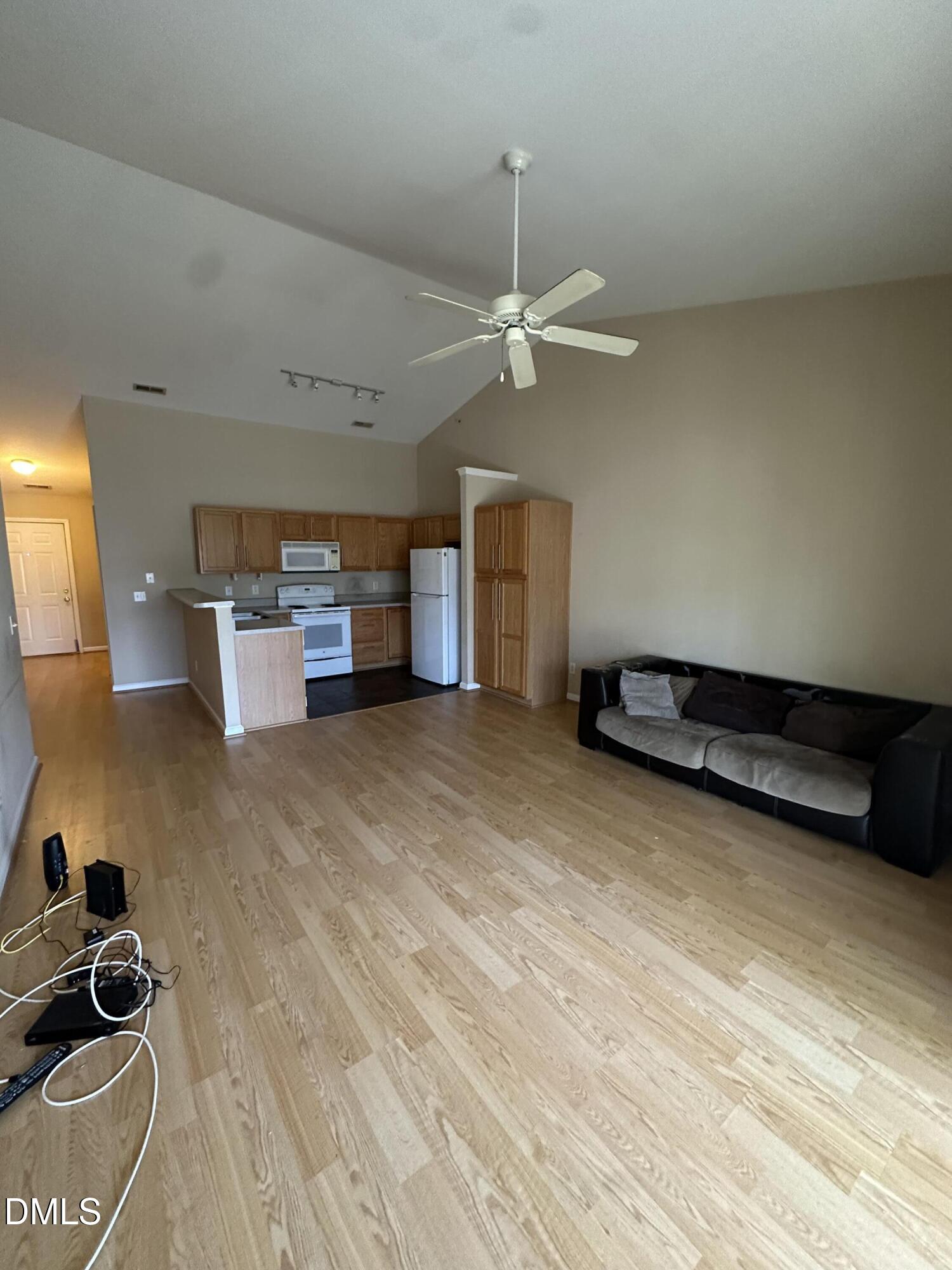 1901 Trailwood Heights Lane, Unit 302 Raleigh, NC 27603 - Photo 11 of 16 a view of livingroom with furniture and ceiling fan