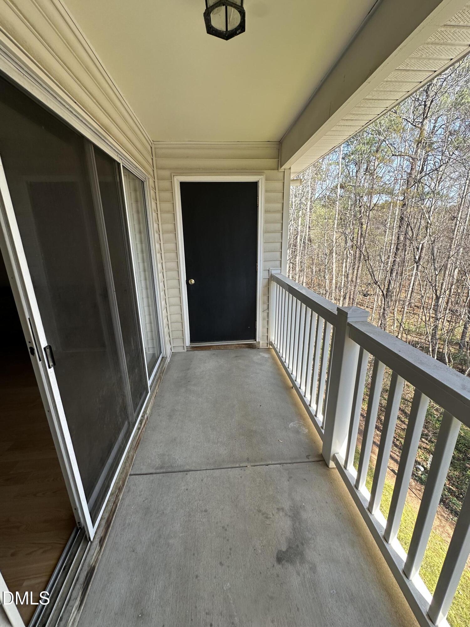 1901 Trailwood Heights Lane, Unit 302 Raleigh, NC 27603 - Photo 15 of 16 a view of a hallway