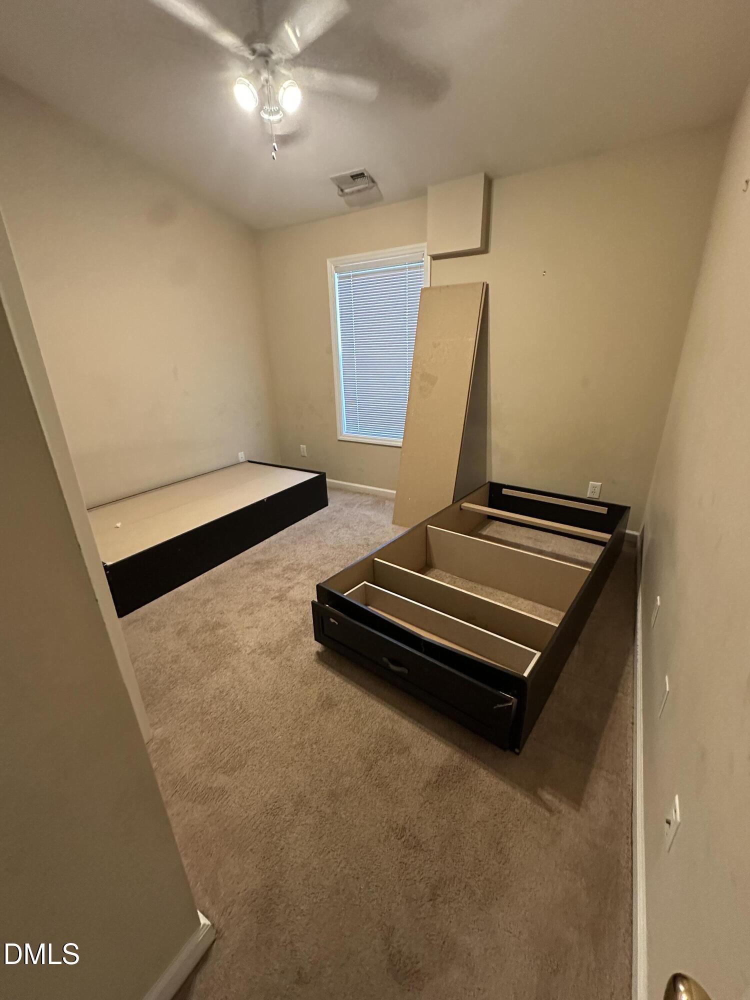 1901 Trailwood Heights Lane, Unit 302 Raleigh, NC 27603 - Photo 5 of 16 a view of a room with gym equipment