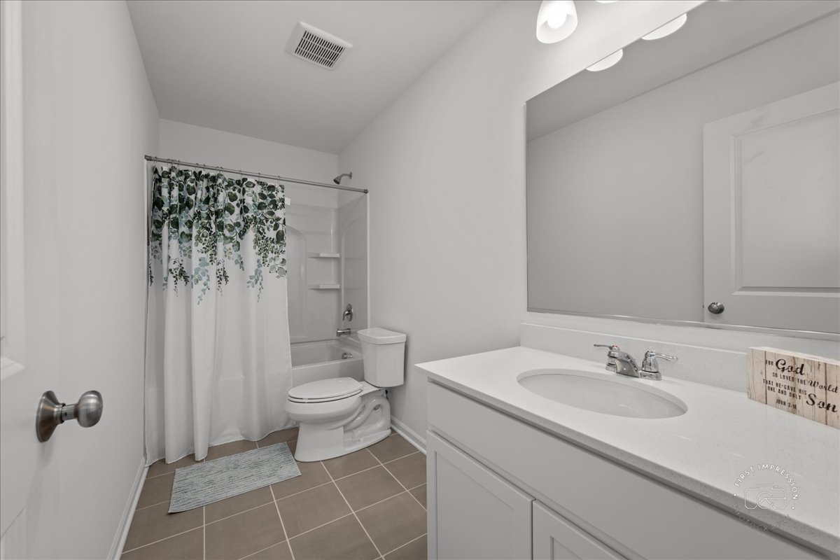 1313 Endicott Road South Elgin, IL 60177 - Photo 17 of 20 a bathroom with a sink toilet and shower