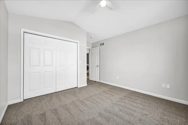 a view of a hallway with seating area