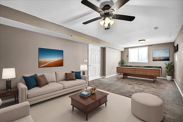 a backyard of a house with table and chairs