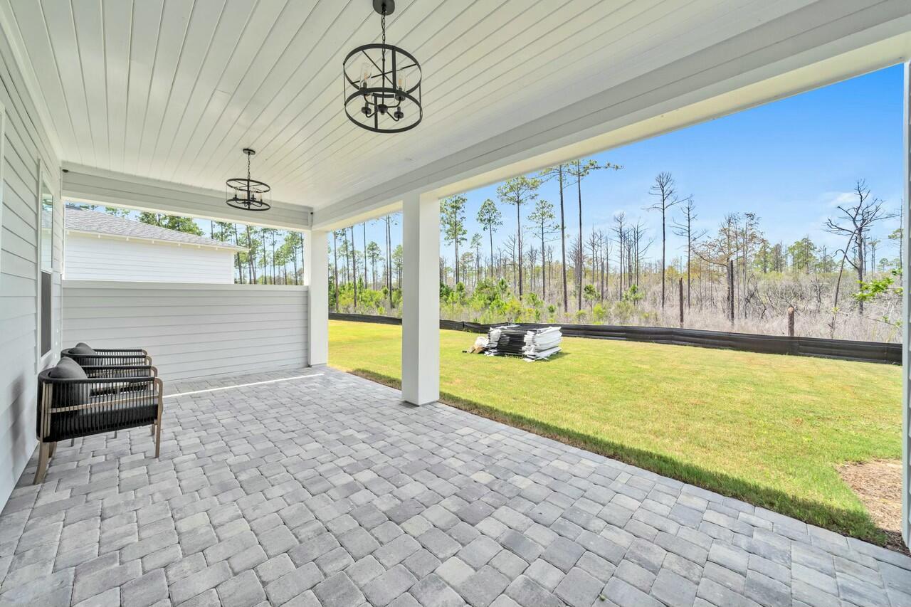 117 River Rise Way Watersound, FL 32461 - Photo 11 of 14 a view of a swimming pool and outdoor space