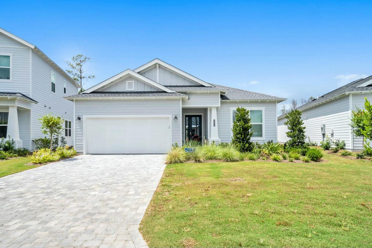 117 River Rise Way Watersound, FL 32461 - Photo 10 of 14 a front view of house with yard