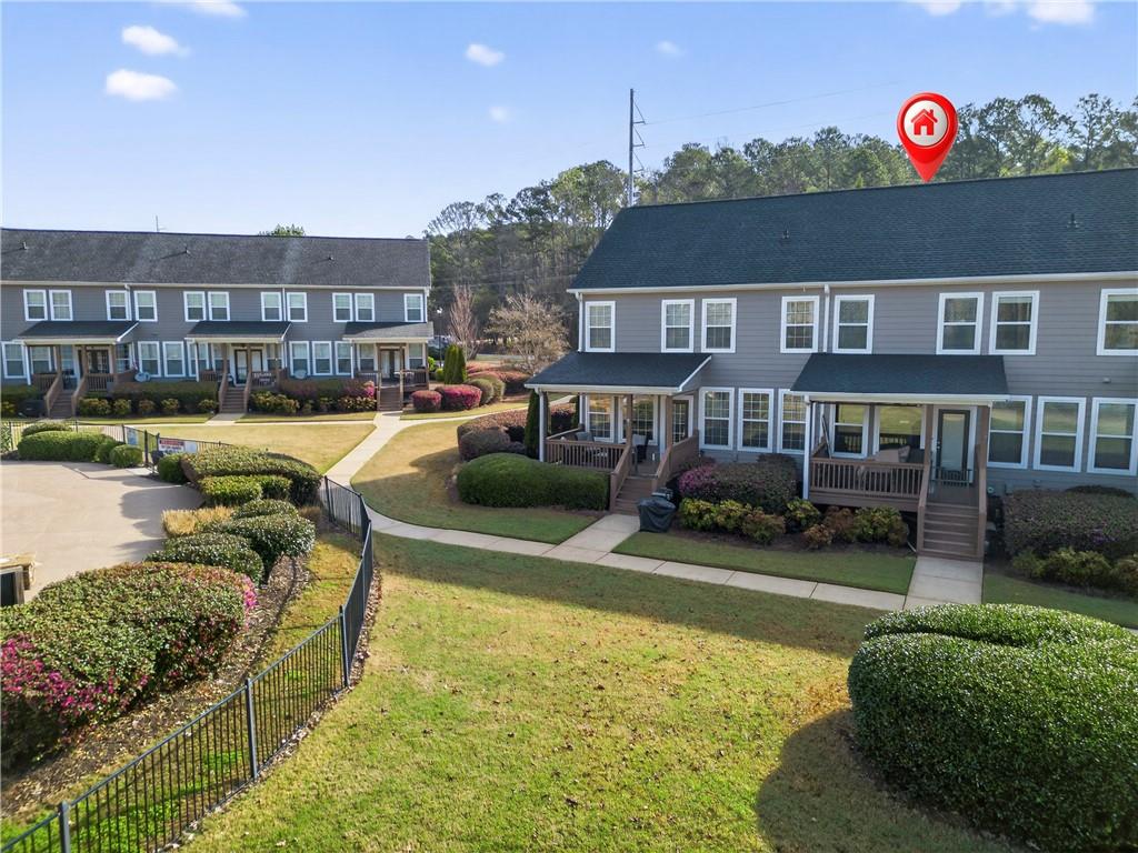 549 Old Phoenix Road Northeast, Unit 104 Eatonton, GA 31024 - Photo 44 of 48 a view of a house with swimming pool