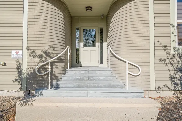 a view of a house with a door and a window