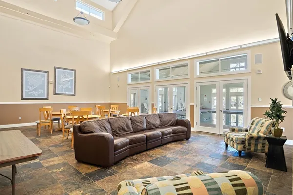 a view of a livingroom with furniture window and outside view